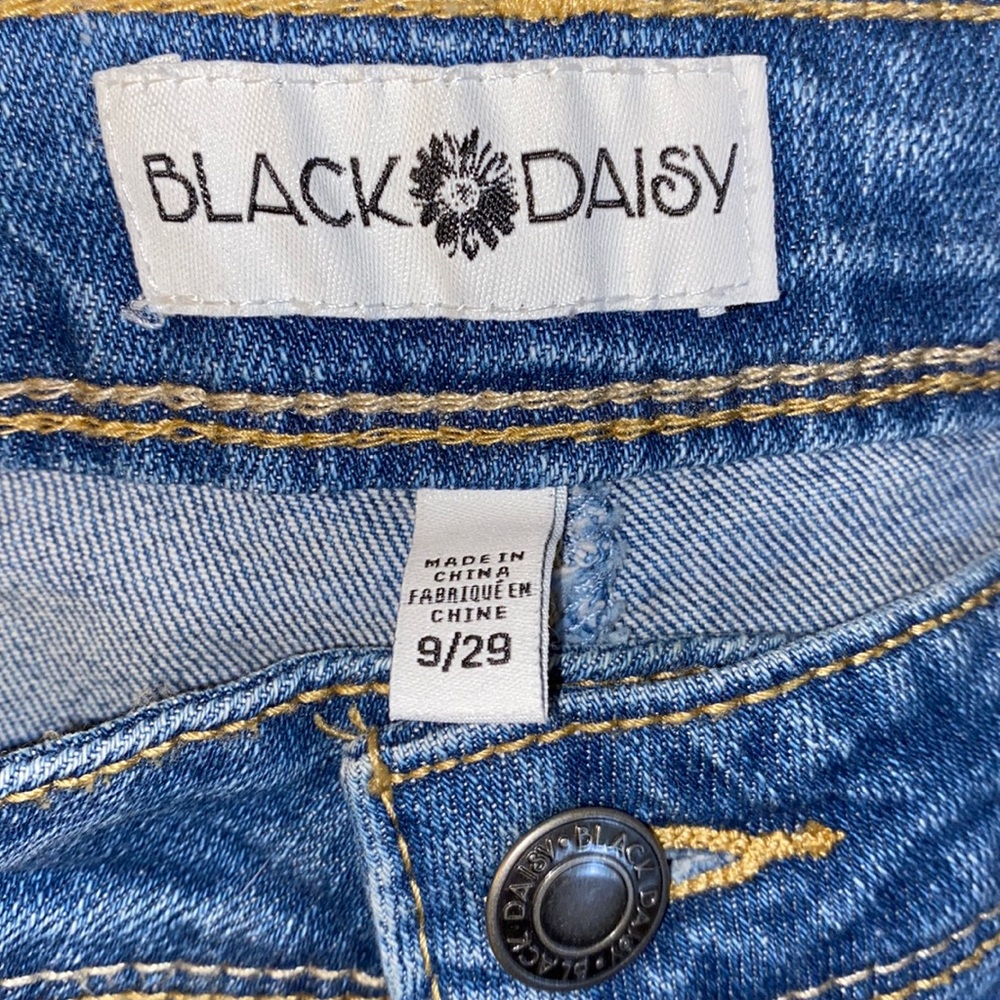 Black daisy blue jeans with beautiful stitching red/pink flowers